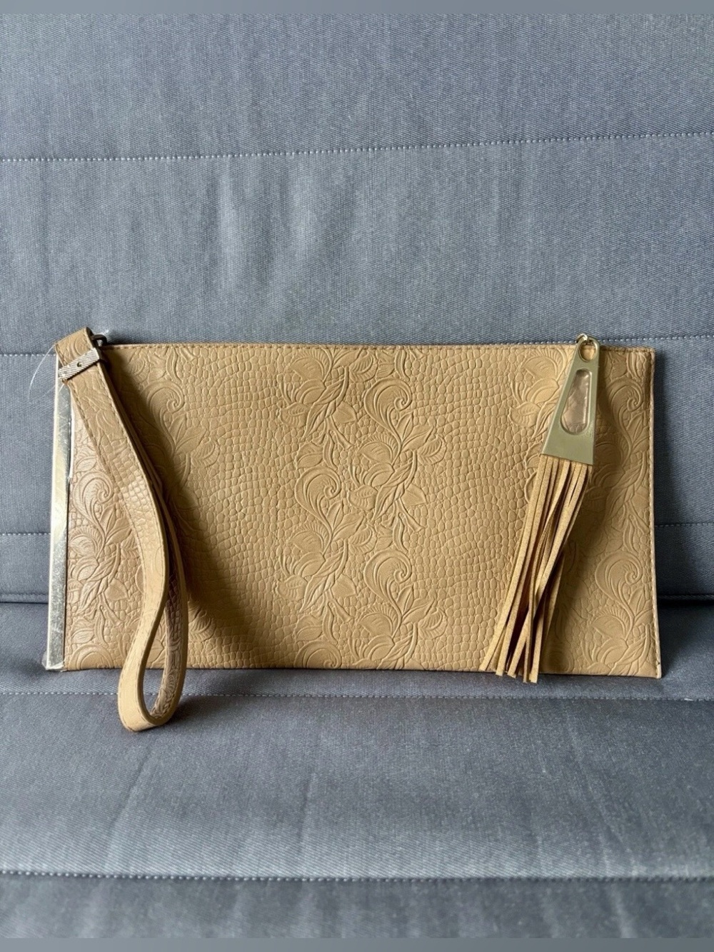 Neutral Tan Embossed Wristlet Clutch with Tassel
